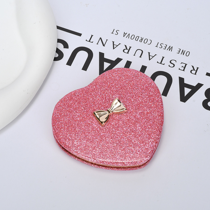 Nœud papillon rose en forme de cœur, cadre intérieur doré + emballage à bulles.