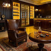Sillón Vintage de Caoba y Cuero con Respaldo de Ala, Clásico Británico Individual con Remaches para Oficina y Salón de Cigarros
