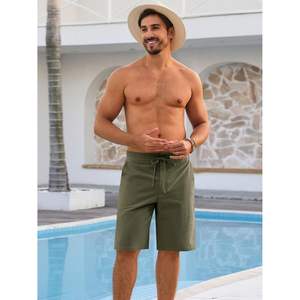 2025กางเกงขาสั้นผ้าชิโน่สำหรับผู้ชายผ้าคอตตอนแบบลำลองมีเชือกผูกเอวกระเป๋าหน้าเรียบใส่ชายหาดฤดูร้อนขนาด XXS XS มีโลโก้ - Product Image 3