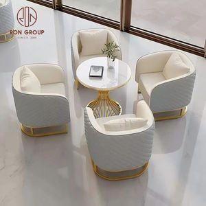 Ensemble de meubles de salle à manger moderne, table ronde en marbre avec base creuse dorée et quatre fauteuils gris pour café - Product Image 5