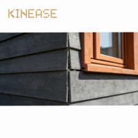 Panneau mural extérieur en fibrociment gris foncé mat pour bardage de façade de maisons en rangée urbaines