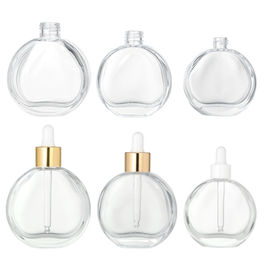 Bouteilles en <span class=keywords><strong>verre</strong></span> transparentes, plates et rondes, vides, pour huiles essentielles, parfums, huiles capillaires, avec compte-gouttes, 50 ml, 60 ml, 100 ml - Product Image 1