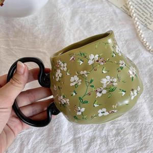 แก้วกาแฟเซรามิกแบบใช้แล้วทิ้งลายดอกไม้เล็กๆ สไตล์ชนบทสีเขียวภูเขาสดชื่น สำหรับงานปาร์ตี้ รุ่นโมเดิร์น 2025 - Product Image 1