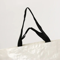 2025 nouveau sac fourre-tout tissé en PP blanc éco-vente en gros avec longue poignée Logo personnalisé Design pur réutilisable pour le shopping