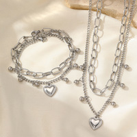 Ensemble de bijoux de créateur en acier inoxydable 304L et or PVD 18K, collier et bracelet double couche avec chaîne à perles en forme de cœur, pour soirée