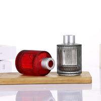 Bouteilles diffuseurs en verre à rayures gaufrées avec bâtonnets en rotin, logo et étiquette personnalisés, flacon d'huile essentielle d'aromathérapie avec boîte