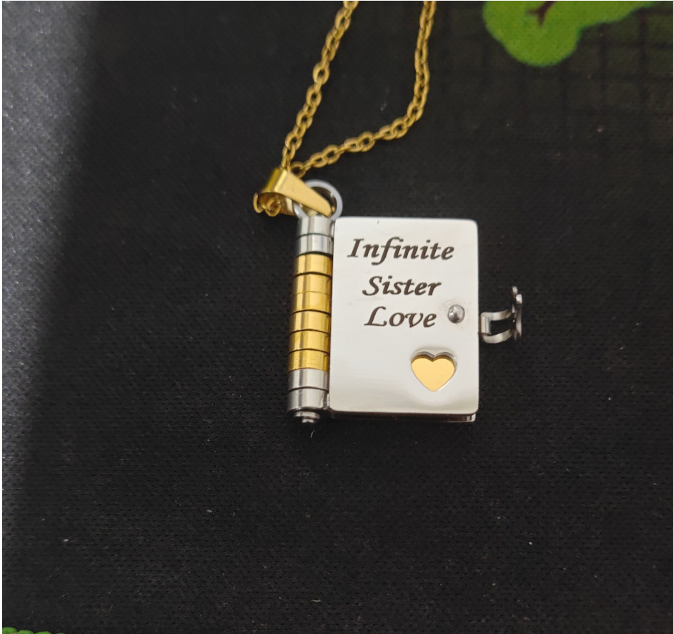 [16] gold books between sisters-lettering