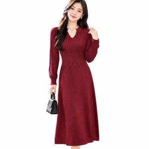 Robe pull en tricot élégante pour femme, col en V, manches longues, coupe midi évasée, couleur unie, pour l'automne - Product Image 1