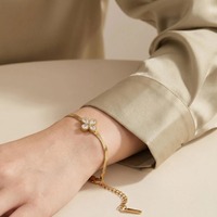Bracelet trèfle à quatre feuilles pour femme ZG avec charm fleur délicat en acier inoxydable plaqué or 18 carats