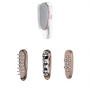 Cepillo Masajeador Vibratorio Recargable para Meridianos |   Cabezales Metálicos para Cabeza, Cuero Cabelludo, Hombros y Rostro |   LED de Pulso EMS - Product Image 1