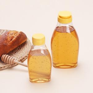 Botellas de Plástico PET de Grado Alimenticio de 250g 500g <span class=keywords><strong>para</strong></span> Miel, con Tapa Abatible y Válvula de Silicona Integrada <span class=keywords><strong>para</strong></span> Jarabes, <span class=keywords><strong>Salsas</strong></span> - Product Image 1