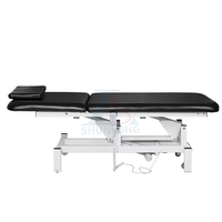 Lit de beauté électrique simple à prix avantageux, entièrement automatique, avec levage, lit de tatouage, lit de physiothérapie avec tubes ronds épaissis