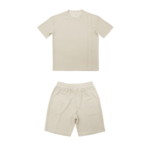 Conjunto de dos piezas de verano estilo americano transfronterizo para hombre: camiseta de manga corta con cuello redondo de punto gofrado de ajuste holgado y pantalones cortos transpirables de talla grande. - Product Image 1
