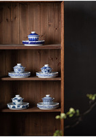 Service à thé en porcelaine bleue, ensemble de cinq pièces, avec tasses à couvercle, en céramique, motif feuille de riz, décor sous glaçure, moderne, portable, idéal pour cadeaux d'affaires