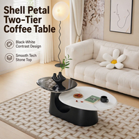 Juego de Mesa de Centro para Sala de Estar Global Export Avant Garde, Diseño Asimétrico de Pétalos, en Blanco y Negro, Dos Niveles, Panel de Vidrio y Piedra Tecnológica