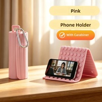 Nouveau support de téléphone pliable en silicone avec mousqueton, support portable pour tablette et ordinateur portable, antidérapant, multi-angles réglables, idéal pour les voyages en avion