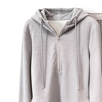 Ensemble sweat à capuche demi-zippé et pantalon large pour femme