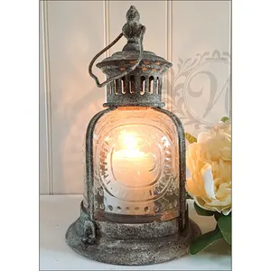 Decorazione all'ingrosso lanterna da pavimento con candela Vintage francese rustica in ferro antico in metallo, portacandele in metallo lanterne barattoli di candela