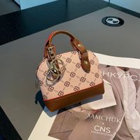 Tas Mini Kulit PU Mewah 2026 Gantungan Kunci Dompet Koin Liontin Pola Kartun Desainer Baru Hadiah Bentuk Oval Hari April Mop