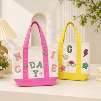 Mini sac fourre-tout non tissé en forme de boule, avec logo personnalisé en letterpress, faible MOQ, vente en gros d'usine, cadeau d'entreprise