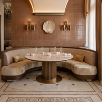Ensemble de mobilier commercial JEILI pour restaurants : banquettes rembourrées, tables rondes et chaises pour projets hôteliers et d'accueil.