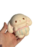 Produit phare : Ours Squishy anti-stress en forme de bavoir, à rebond lent, mignon, jouet de compression, boîte surprise, vente en gros