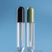 Récipient à rouge à lèvres en plastique transparent de luxe OEM Tube de balle de brillant à lèvres vide avec logo personnalisé avec sérigraphie Étiquetage cosmétique