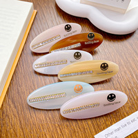 Pinces à cheveux ovales vintage en acétate pour femmes épingles à cheveux latérales en strass sourire visage logo en métal épingles à cheveux bec de canard