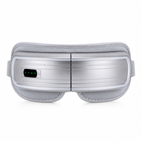 Masseur oculaire personnalisé à marque privée avec compresse chaude, pression d'air, vibration, musique, design pliable sans fil pour OEM ODM en gros