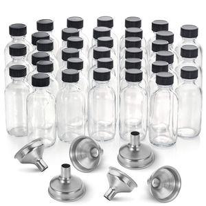 Petites bouteilles en verre transparent de 2 oz produites en usine de 60ml avec couvercles Entonnoirs en acier inoxydable Bouteilles d'échantillons Boston pour jus de potion - Product Image 1