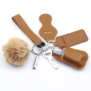Ensemble de <span class=keywords><strong>porte</strong></span>-clés sifflet d'extérieur 7-en-1 avec étui en cuir PU et breloque <span class=keywords><strong>pompon</strong></span>, <span class=keywords><strong>porte</strong></span>-clés multifonction - Product Image 3