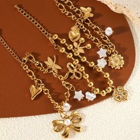 Ensemble de bijoux fantaisie deux pièces pour femme, plaqué or, en alliage de zinc, avec bracelets à breloques géométriques et bague style spirale anti-moustiques