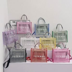 Sac fourre-tout transparent grande capacité avec fermeture éclair, sac à bandoulière tendance en gelée transparente pour femme - Product Image 1