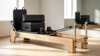 Reformer de Pilates en bois de hêtre MJD, machine de Pilates de qualité professionnelle, adaptée aux séances de Pilates et de yoga.