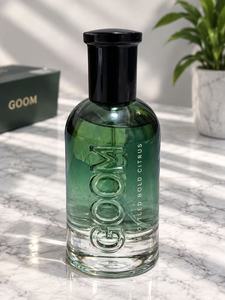 Flacon vaporisateur de parfum en verre vert 100 ml, rechargeable, vide, avec bouchon noir pour emballage personnalisé - Product Image 1