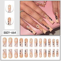 Vente en gros usine : Faux ongles à presser longs forme cercueil, motifs léopard nude et fleurs blanches avec strass, réutilisables, personnalisables OEM ODM
