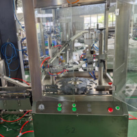 Machines de remplissage d'aérosols pour extincteurs à pulvérisation automatique à grande vitesse pour mousse de pulvérisation