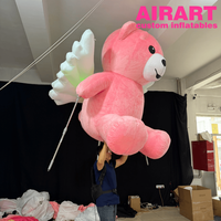 Marionnette ours en peluche rose pour la décoration des centres commerciaux et des parcs d'attractions, costume d'ours de dessin animé ambulant pour les défilés