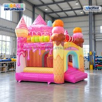 Château gonflable commercial rose sur le thème des beignets et de la crème glacée pour la location de fêtes d'enfants