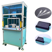Machine de boxe semi-automatique pour l'emballage de consommables de laboratoire