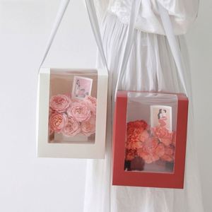 Sac en papier couché transparent de luxe, portable, avec poignées longues, ruban, matériaux recyclés, couleurs marron et blanc, emballage cadeau - Product Image 1