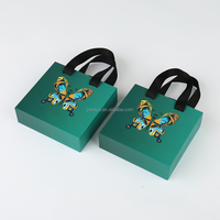 Boîte cadeau en carton de papier d'art personnalisé pour bijoux montre emballage avec tiroir coulissant UV estampage à chaud poignée de ruban doublure en éponge