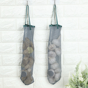 Bolsas de malla multifuncionales para almacenar frutas y verduras en la cocina, para colgar y transportar jengibre, ajo, cebollas y otros. - Product Image 1