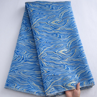Tissu en dentelle brodée africaine bleue unie en gros 2025, dentelle damassée dorée brodée à la française pour robes de mariée femme 4063