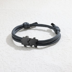 สร้อยข้อมือสแตนเลสสตีลชุบ PVD 18k แบบขายส่ง พร้อมจี้รูปจิ๊กซอว์ สร้อยข้อมือเชือกถักมิลานแบบทำมือสำหรับคู่รัก - Product Image 4