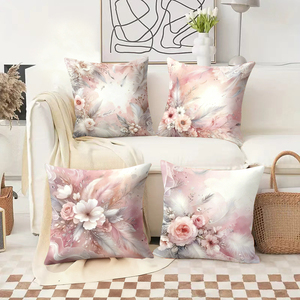 Almohadas decorativas con plumas florales rosas adornan la acogedora sala de estar con medias navideñas y astas de reno. - Product Image 2