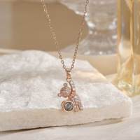 Collier pendentif Ours de dessin animé en cuivre avec pierre de projection incrustée de zircon, chaîne en bambou longueur clavicule, style sportif, 100 langues