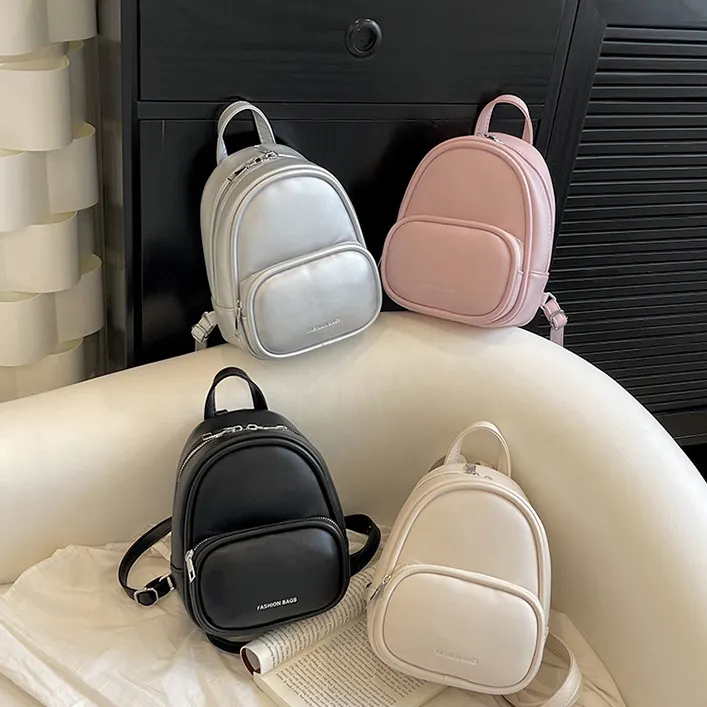 Yeni varış moda trend PU deri çanta bayanlar küçük sevimli geri paketi kızlar seyahat okul Mini sırt çantası kadınlar için
