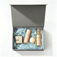 Boîte cadeau pliante élégante grise magnétique, boîte en papier pliable personnalisée avec logo et papier de remplissage pour l'emballage de produits de soin et de cosmétiques
