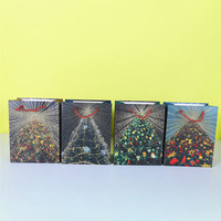 Sacs en papier Omet Dusted Christmas Tree utilisés pour les sacs cadeaux de Noël